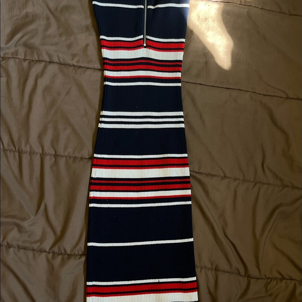 This is a body con dress that has been worn a few times still in new condition